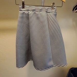 Knee length black and white skirt